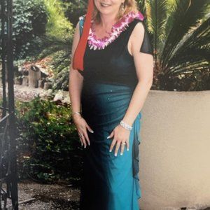 Formal, teal umbra with speckles of sparkle